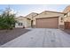 One-story house with a two-car garage and desert landscaping at 4360 N 186Th Ln, Goodyear, AZ 85395