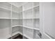 Large walk-in pantry with ample shelving at 4360 N 186Th Ln, Goodyear, AZ 85395