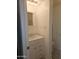 Clean bathroom with single sink vanity, shower/tub combo, and updated flooring at 17200 W Bell Rd # 1015, Surprise, AZ 85374