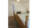 Spacious bedroom with carpeted floor and wooden bed frame at 17200 W Bell Rd # 1015, Surprise, AZ 85374