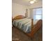 Large bedroom with a queen-sized bed, carpet, and window coverings at 17200 W Bell Rd # 1015, Surprise, AZ 85374