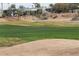 Scenic view of the lush green golf course with mature landscaping in a vibrant community at 17200 W Bell Rd # 1015, Surprise, AZ 85374