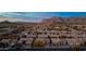 Aerial view of a residential area with mountain backdrop and homes at 8546 E Brittle Bush Rd, Gold Canyon, AZ 85118