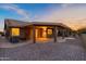 Covered patio with pavers and lighting, adjacent to the house at 8546 E Brittle Bush Rd, Gold Canyon, AZ 85118