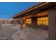 Large covered patio with flagstone and multiple ceiling fans at 8546 E Brittle Bush Rd, Gold Canyon, AZ 85118