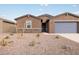 Single story home with attached garage and desert landscaping at 3650 E Alexander Dr, San Tan Valley, AZ 85143