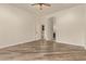 Bright bedroom with wood-look floors and a ceiling fan at 10101 E Posada Ave, Mesa, AZ 85212