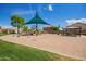 This playground with shade structure offers multiple play options for of all ages in a community park at 10101 E Posada Ave, Mesa, AZ 85212