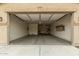 Spacious open garage with ample room for vehicles and storage at 12121 W Patrick Ln, Sun City, AZ 85373