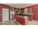 Spacious kitchen featuring an island, stainless steel appliances, and granite countertops at 12121 W Patrick Ln, Sun City, AZ 85373