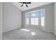 Spacious bedroom bathed in light from a beautiful bay window, providing a serene and airy atmosphere at 1325 W Muirwood Dr, Phoenix, AZ 85045