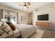 Main bedroom with access to backyard and large TV at 5209 E Sierra Sunset Trl, Cave Creek, AZ 85331