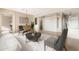 Bright living room with large windows, hardwood floors, and comfortable seating at 5209 E Sierra Sunset Trl, Cave Creek, AZ 85331