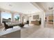 Spacious living area featuring hardwood floors, large windows, and access to backyard at 5209 E Sierra Sunset Trl, Cave Creek, AZ 85331