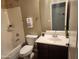 Clean bathroom with a single vanity and shower/tub combo at 2946 E Quiet Hollow Ln, Phoenix, AZ 85024