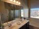 Double vanity bathroom with a large soaking tub and shower at 2946 E Quiet Hollow Ln, Phoenix, AZ 85024