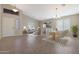 Bright dining room with a table and chairs, adjacent to the living room at 2946 E Quiet Hollow Ln, Phoenix, AZ 85024