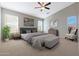 Relaxing main bedroom with a king-size bed and sitting area at 2946 E Quiet Hollow Ln, Phoenix, AZ 85024