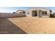 Large backyard with block wall and sandy terrain at 9115 N 173Rd Ln, Waddell, AZ 85355