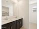 Modern bathroom with double vanity and walk-in shower at 9115 N 173Rd Ln, Waddell, AZ 85355