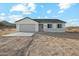 Charming single-story home featuring a two-car garage and low-maintenance desert landscaping at 13634 S 192Nd Ave, Buckeye, AZ 85326