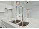 Close-up of an island sink with quartz countertops and plenty of room for cooking or entertaining at 13634 S 192Nd Ave, Buckeye, AZ 85326