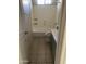 Well-lit bathroom featuring a shower-tub combo, vanity, and tiled flooring at 141 N Pasadena --, Mesa, AZ 85201