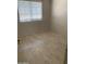 Cozy bedroom featuring wood-look flooring and a window with horizontal blinds at 141 N Pasadena --, Mesa, AZ 85201