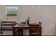 Simple dining room with natural light and wood furniture at 16468 W Mariposa Grande --, Surprise, AZ 85387