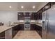 Beautiful kitchen with stainless steel appliances and granite countertops at 16468 W Mariposa Grande --, Surprise, AZ 85387