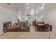 Bright and airy living area with tile floors and ceiling fan at 16468 W Mariposa Grande --, Surprise, AZ 85387