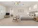 Serene main bedroom with a neutral palette, comfortable furnishings, and ample natural light at 21774 E Camacho Rd, Queen Creek, AZ 85142