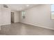 Spacious living room with tile floors, bright windows, recessed lights, and neutral tones to accommodate your decor at 5649 N 205Th Ln, Buckeye, AZ 85396
