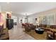 Spacious living room with ample natural light, comfortable seating, and stylish decor at 7979 E Princess Dr # 13, Scottsdale, AZ 85255