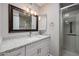 Modern bathroom with granite vanity, updated fixtures, and walk-in shower at 9346 E Citrus N Ln, Sun Lakes, AZ 85248