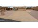 Charming single-story home featuring a desert landscape, concrete driveway, and attached two-car garage at 9346 E Citrus N Ln, Sun Lakes, AZ 85248