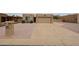 Charming single-story home featuring a desert landscape, concrete driveway, and attached two-car garage at 9346 E Citrus N Ln, Sun Lakes, AZ 85248