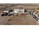 Aerial view of house, large lot, and various outbuildings at 12601 S Hermit Rd, Buckeye, AZ 85326