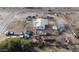 Aerial view of house, several outbuildings, and a large lot at 12601 S Hermit Rd, Buckeye, AZ 85326