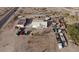 Aerial view of property showcasing house and various outbuildings at 12601 S Hermit Rd, Buckeye, AZ 85326