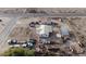 Aerial view showing a house and several outbuildings on a large lot at 12601 S Hermit Rd, Buckeye, AZ 85326