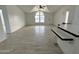 Open living room showcasing a vaulted ceiling and wood-look floors at 12601 S Hermit Rd, Buckeye, AZ 85326