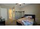 Cozy bedroom with built-in shelving and ensuite bathroom at 2285 E Mead Dr, Gilbert, AZ 85298