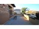 Front patio with brick flooring and two black chairs at 2285 E Mead Dr, Gilbert, AZ 85298