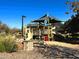 Community playground with shaded play structures at 2285 E Mead Dr, Gilbert, AZ 85298