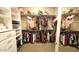 Spacious walk-in closet with ample hanging and shelving space at 2285 E Mead Dr, Gilbert, AZ 85298