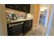 Butler's pantry with wine cooler, coffee bar, and ample storage at 2285 E Mead Dr, Gilbert, AZ 85298