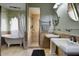 Stylish bathroom featuring a soaking tub, walk-in shower, and dual sinks at 6411 S River Dr # 26, Tempe, AZ 85283