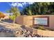 Stone wall with beautiful decorative sign for The Cottonwoods of Anozira community at 6411 S River Dr # 26, Tempe, AZ 85283