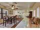 Open living room boasts natural light, fireplace, and a view of the home's unique architectural details at 6411 S River Dr # 26, Tempe, AZ 85283